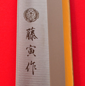 Gros plan lame couteau Tojiro yanagiba Fuji Japon Japonais