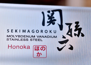 Primer plano Kai Seki magoroku cuchillo Serie HONOKA santoku Japón Japonés